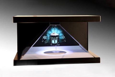 全息投影技术（front-projected holographic display）也称虚拟成像技术